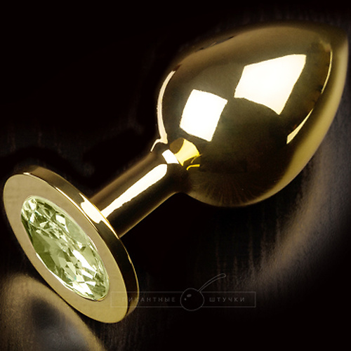 Большая анальная пробка со стразом, золотая с салатовым кристаллом